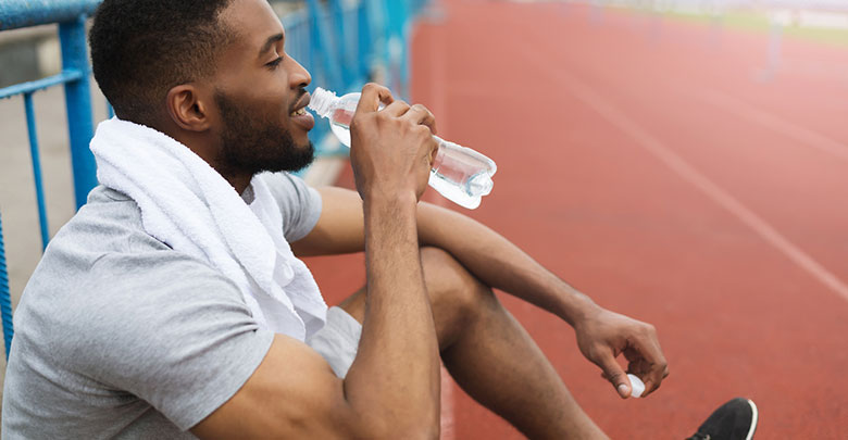 This runner is resting to avoid over training which can lead to knee injury