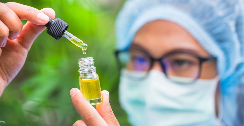 CBD oil is examined by a laboratory technician 